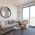 a living room with a large mirror