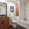 a bathroom with a tub toilet and sink