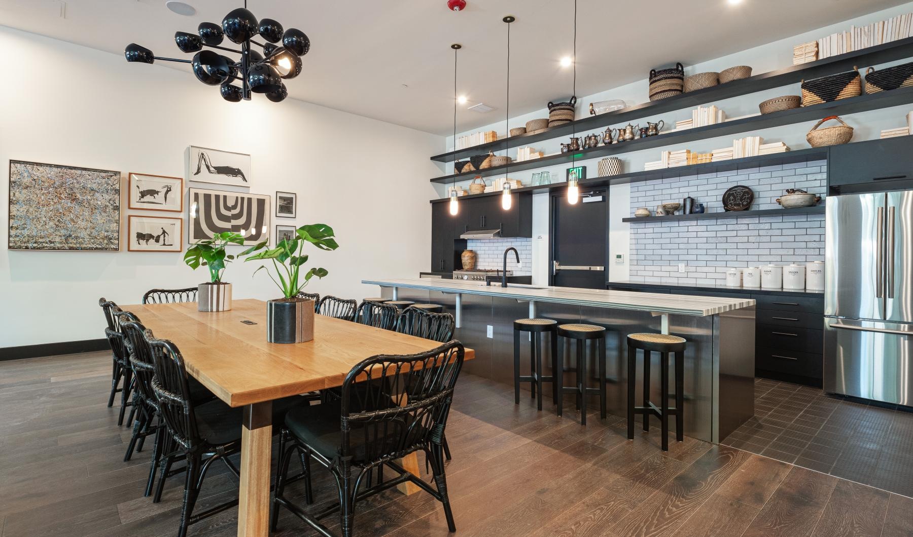 Take advantage of all The Addison has to offer a kitchen with a table and chairs