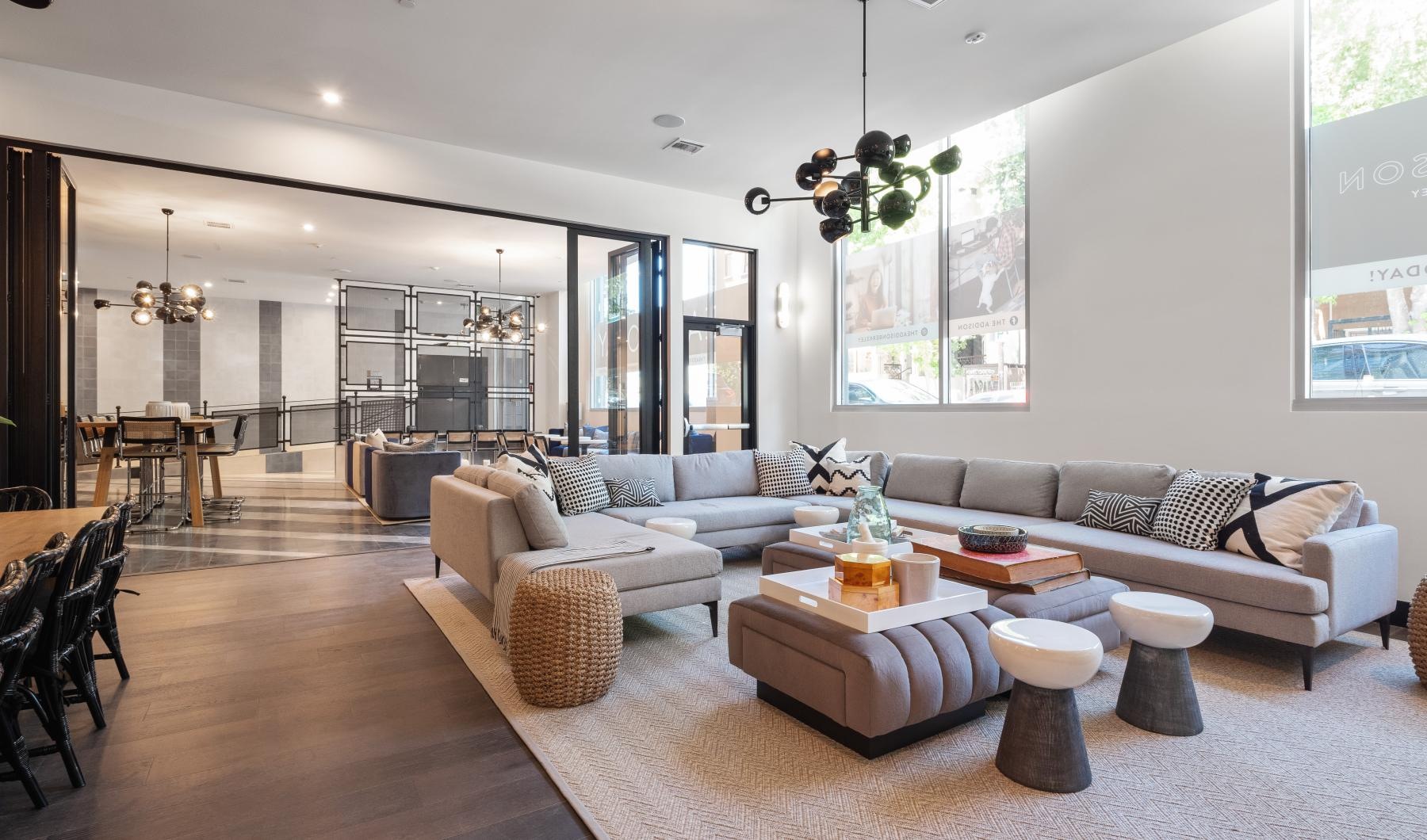 Enjoy our resident-only features a living room with a large glass wall