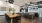 a kitchen with a table and chairs