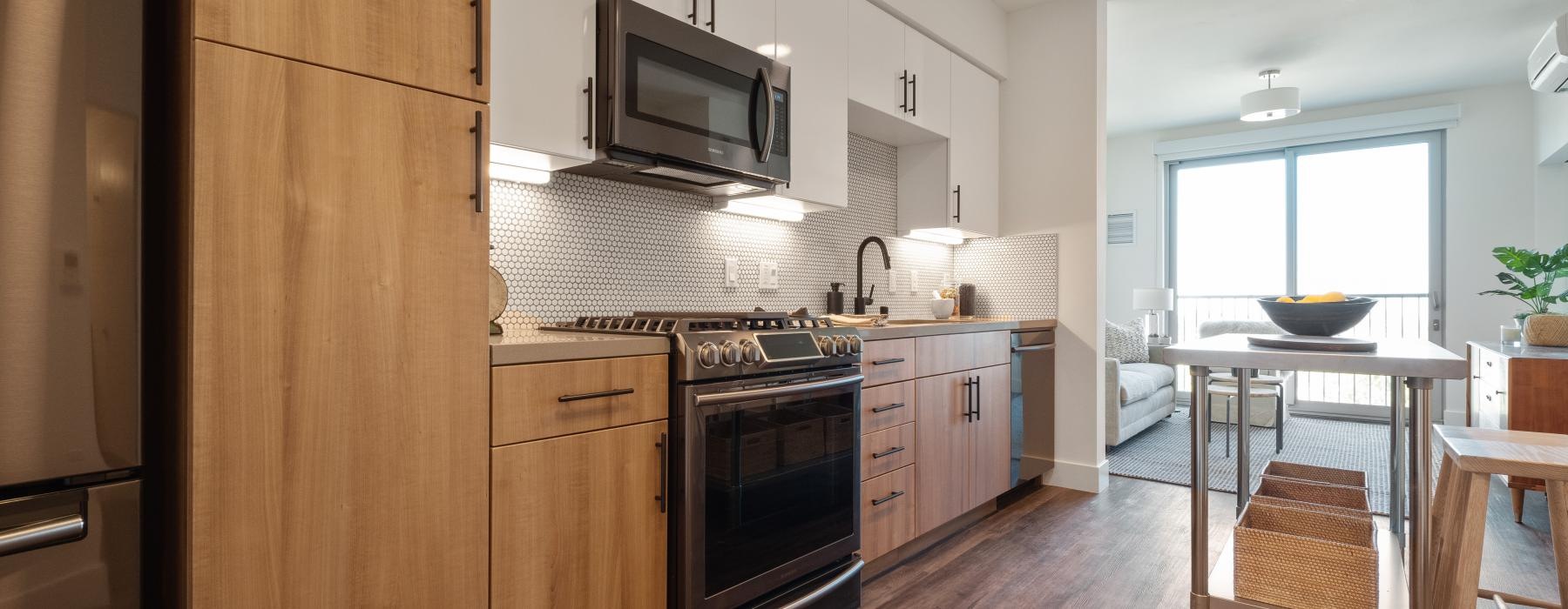 a kitchen with wooden cabinets